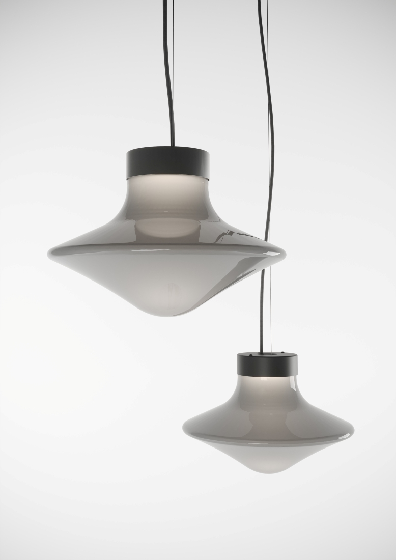 Brokis Trottola Pendants in pearl grey glass, handblown with sculptural silhouettes, hang elegantly on black cords.