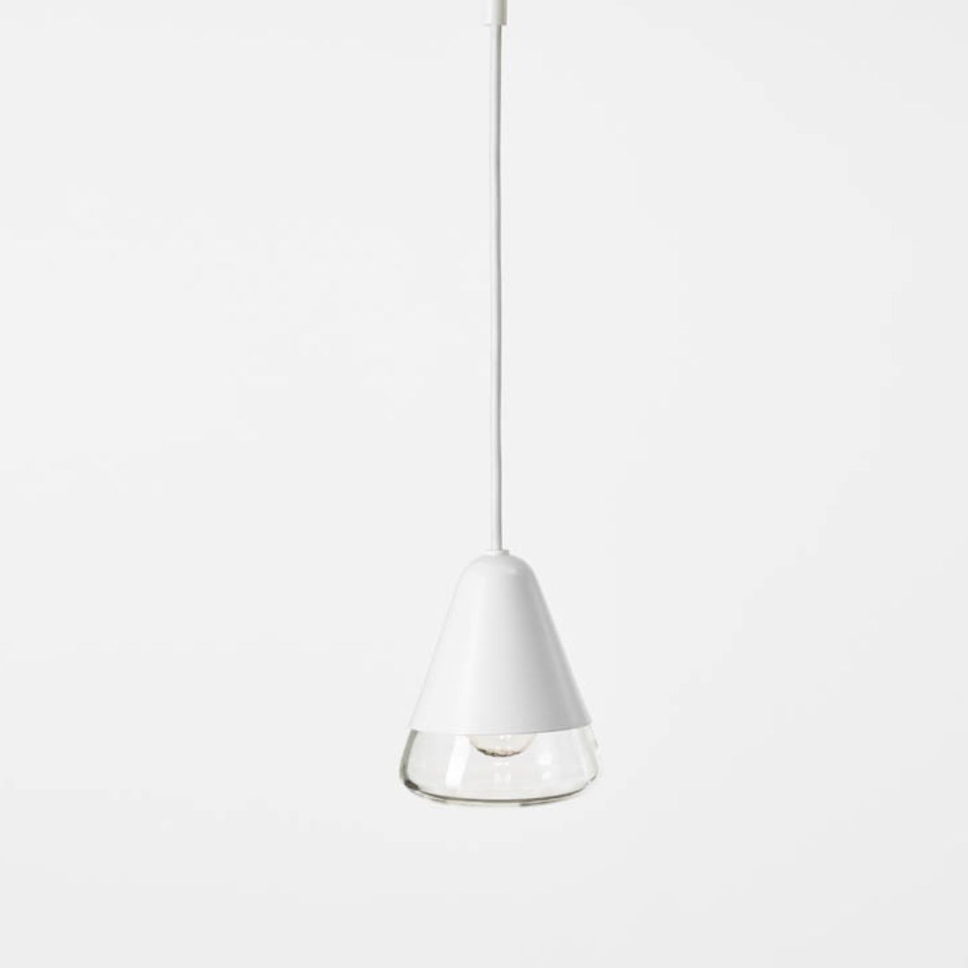 Brokis Puro Spotlight: a handblown crystal pendant with a sculptural cone shade and exposed bulb, suspended elegantly.