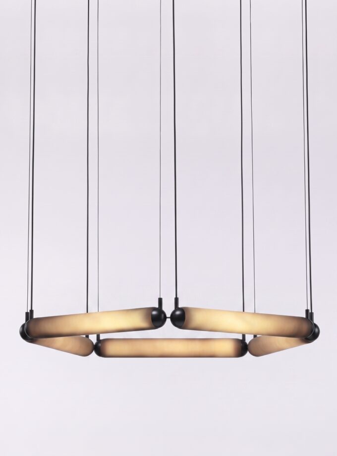 Brokis Puro Contour Pentagon 800 in dark opaline glass.