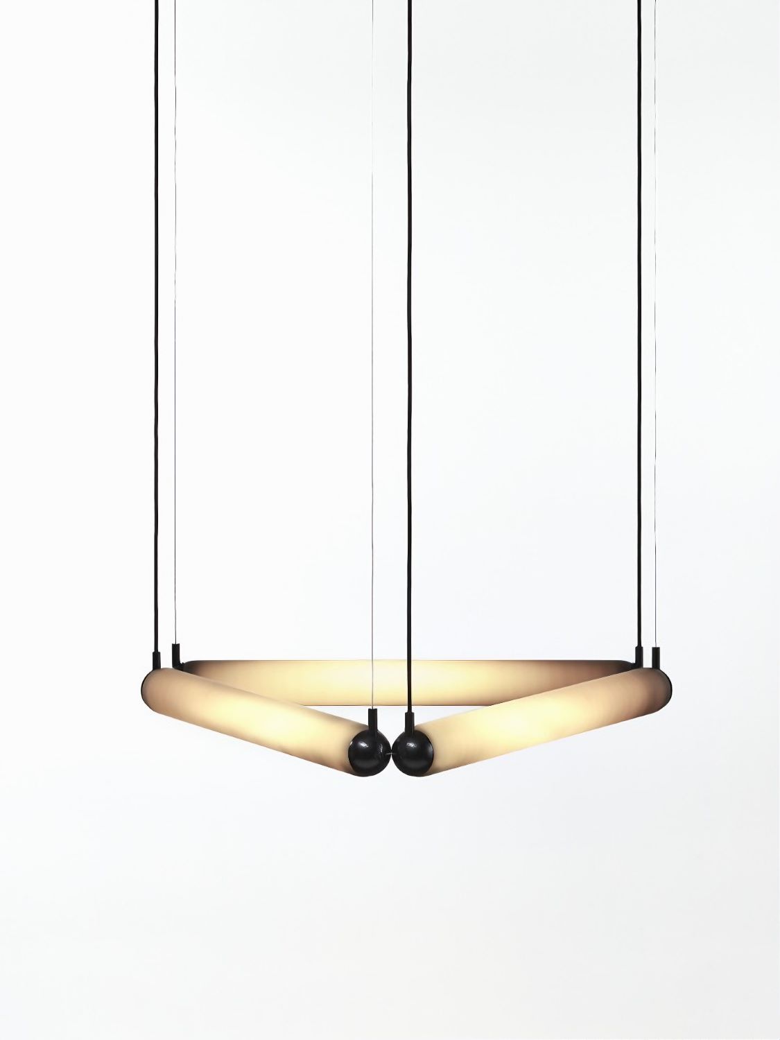 Brokis Puro Contour Triangle 600 Chandelier: sculptural, handblown frame with a soft glow, accented by luxe black spheres.