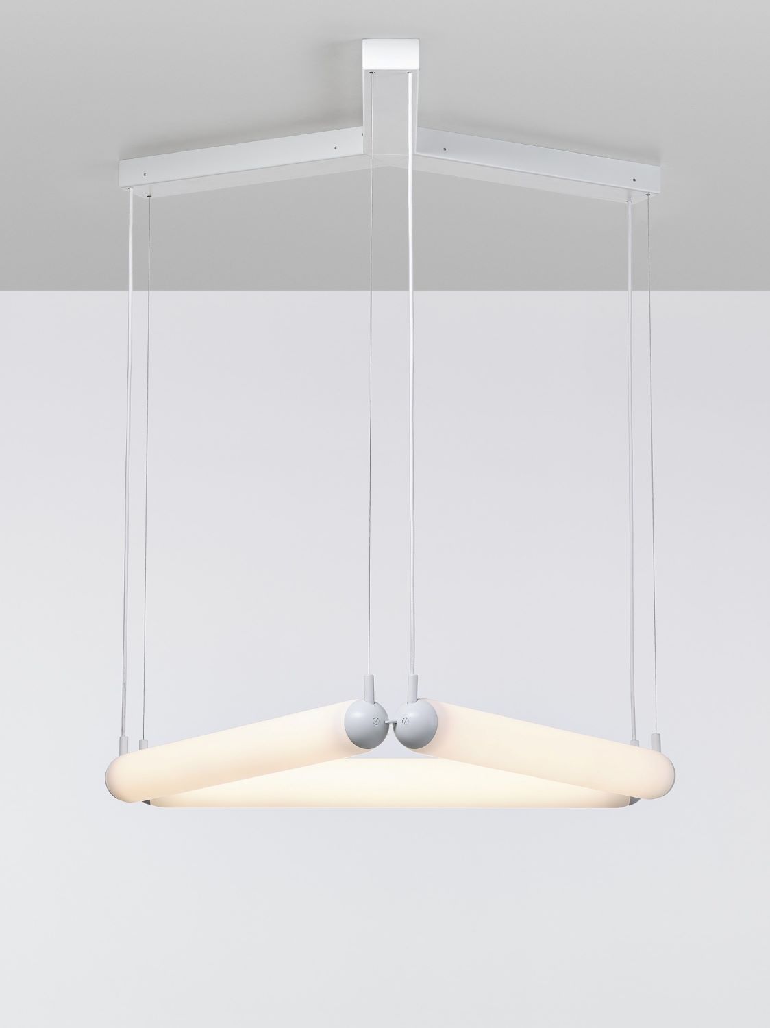 Brokis Puro Contour Triangle 800 Chandelier exudes luxury with handblown frosted glass, sculpted lines, and ethereal glow.