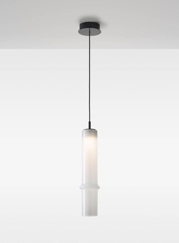 Brokis Bamboo Forest L Down Pendant in handblown opaline glass, suspended from a black flex, emits an elegant diffused glow.