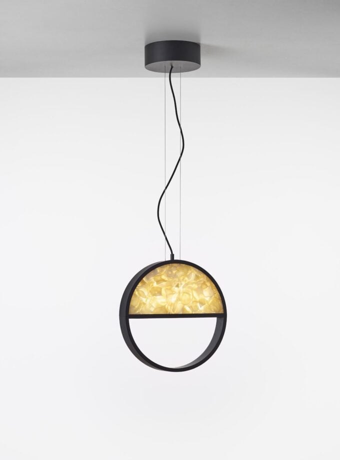 Brokis Geometric Circle 1/2 Top Pendant: a handblown black ring with glowing, sculpted yellow glass radiance above.