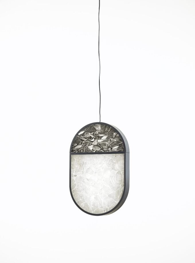 Brokis Geometric Oval Full Top Pendant with a metallic frame, and BROKISGLASS shade diffuser glowing softly.