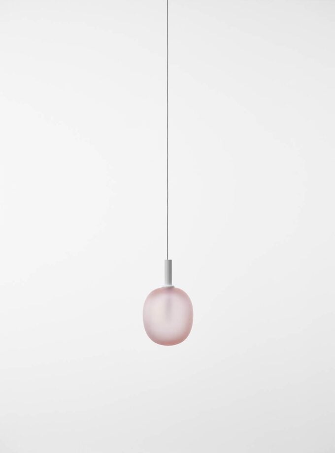 Brokis Ivy Single L Pendant showcases a handblown light pink glass shade, suspended elegantly from a slender silver cord.