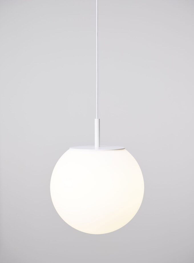 Brokis Sfera 300 Pendant, a sculptural handblown sphere, suspends elegantly, glowing softly against a light grey backdrop.