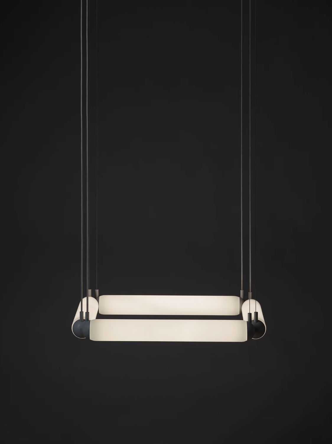 Brokis Puro Contour Square 600 Chandelier: sculptural, handblown glass tubes glow softly, suspended by slim black cords.