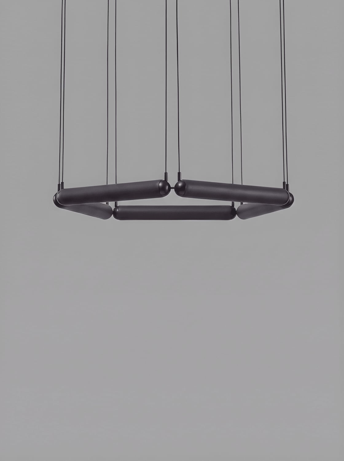 Brokis Puro Contour Pentagon 600 in dark opaline glass.
