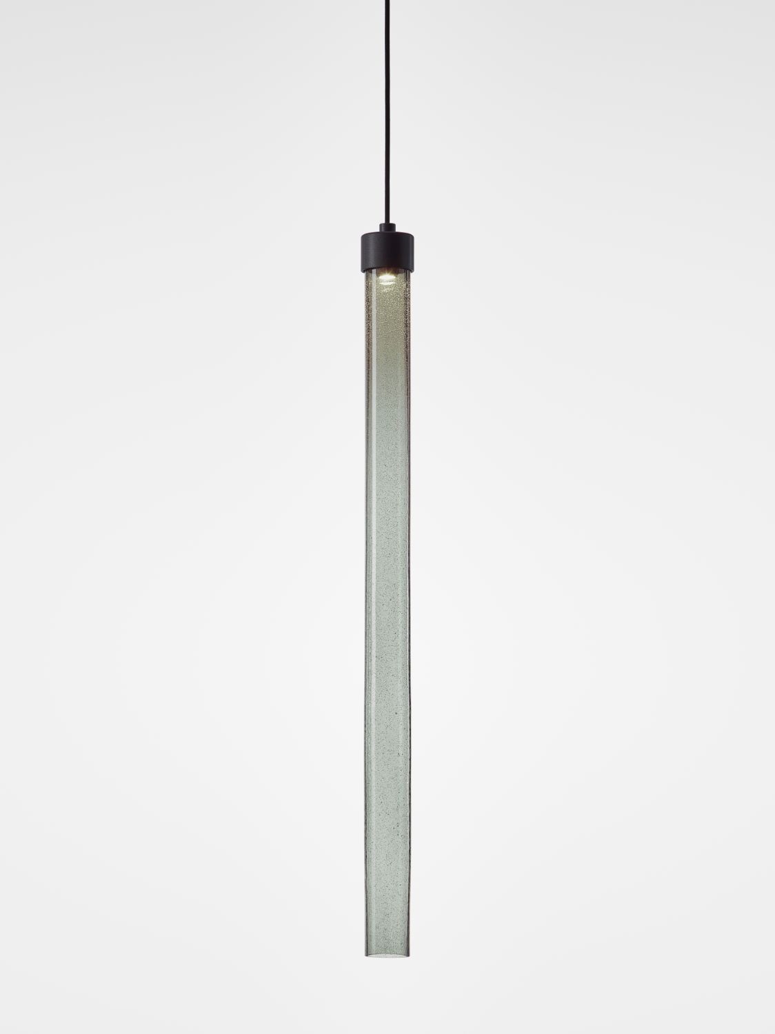 Brokis Comet Round 900 Pendant showcases sculptural hand-blown glass suspended from a slender black cord in minimal elegance.