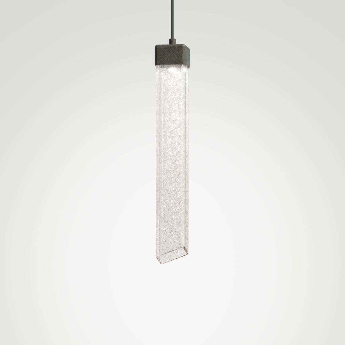 Brokis Comet Square 480 Pendant showcases sculptural hand-blown glass illuminated elegantly against a white backdrop.