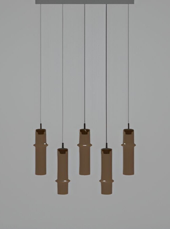 Brokis Bamboo Forest R5C ceiling light: six sculptural brown pendants in handblown glass, suspended at varying heights.