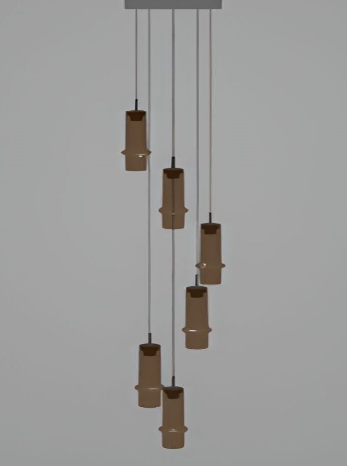 Brokis Bamboo Forest C6A pendant lights in sculptural wood and glass cascade elegantly from a sleek ceiling mount, minimalist and luxurious.