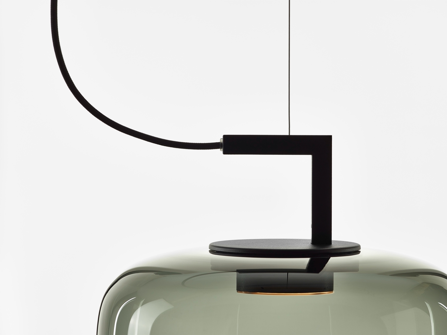 Close-up of a Brokis Double Medium Pendant with smoke grey glass, black metal accents, and luxe minimal design.