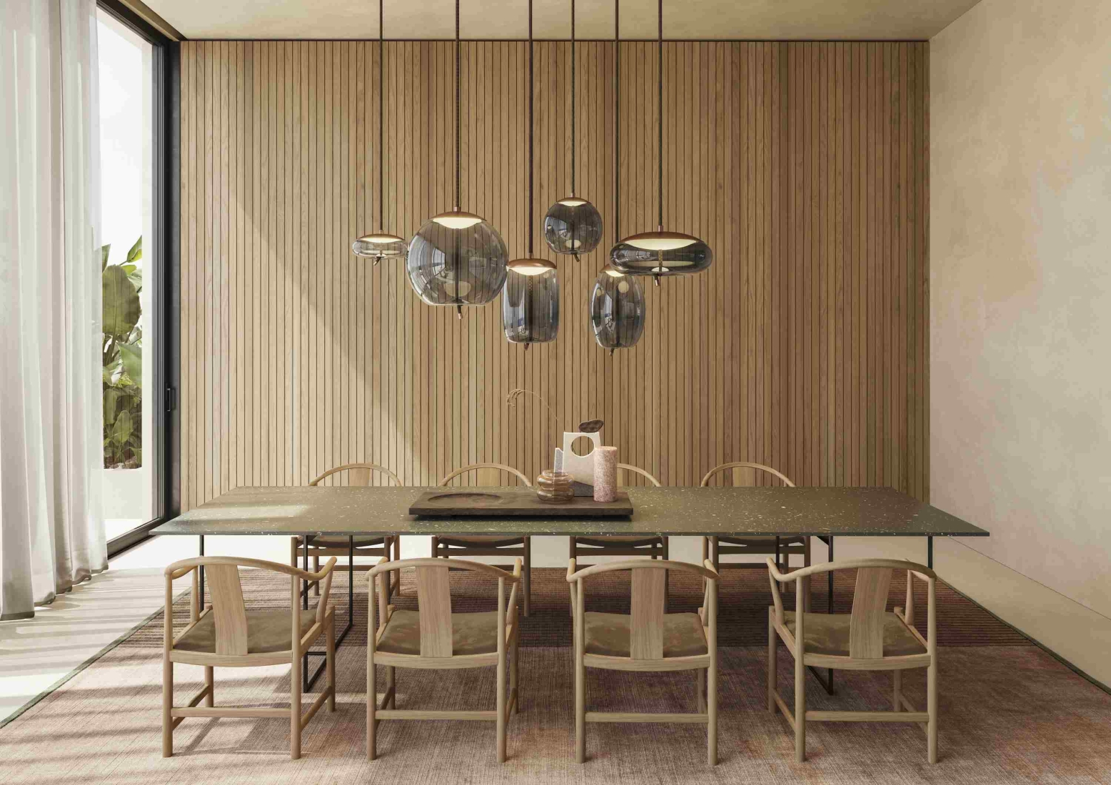 A modern dining room with a long black table, wooden chairs, Brokis Knot pendants, and sheer curtains.