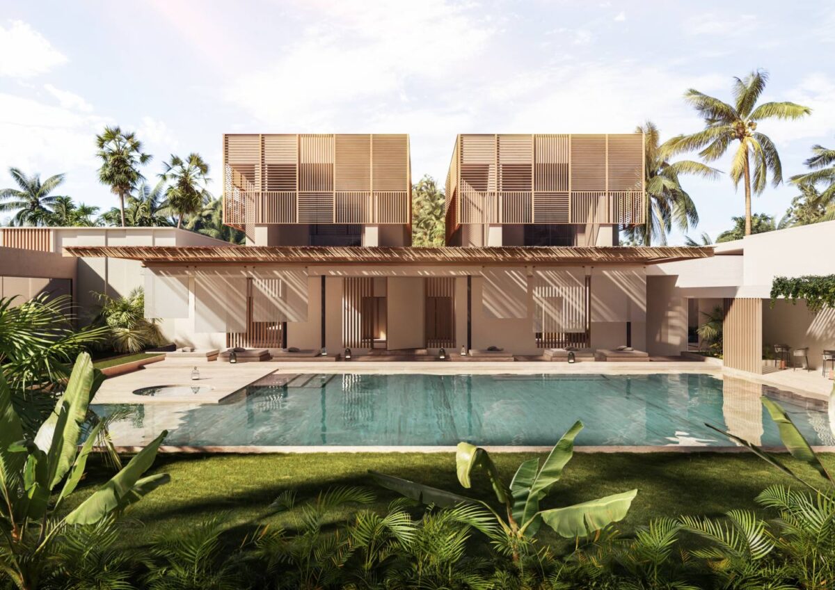 Villa with two upper-levels, wooden façades, vast glass doors to a turquoise pool, lush lawn, and palm-framed gardens.