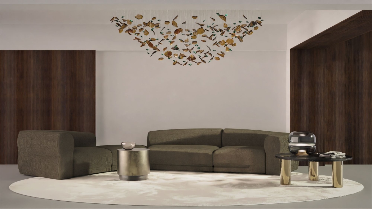 Luxury living room with dark olive corner sofa, sculptural BROKISGLASS Bloom Oval Tornado, accented tables, and plush rug.