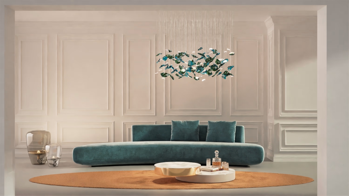 A chic living room with a teal curved sofa, round rug, low table, BROKISGLASS Bloom Round Cloud chandelier.