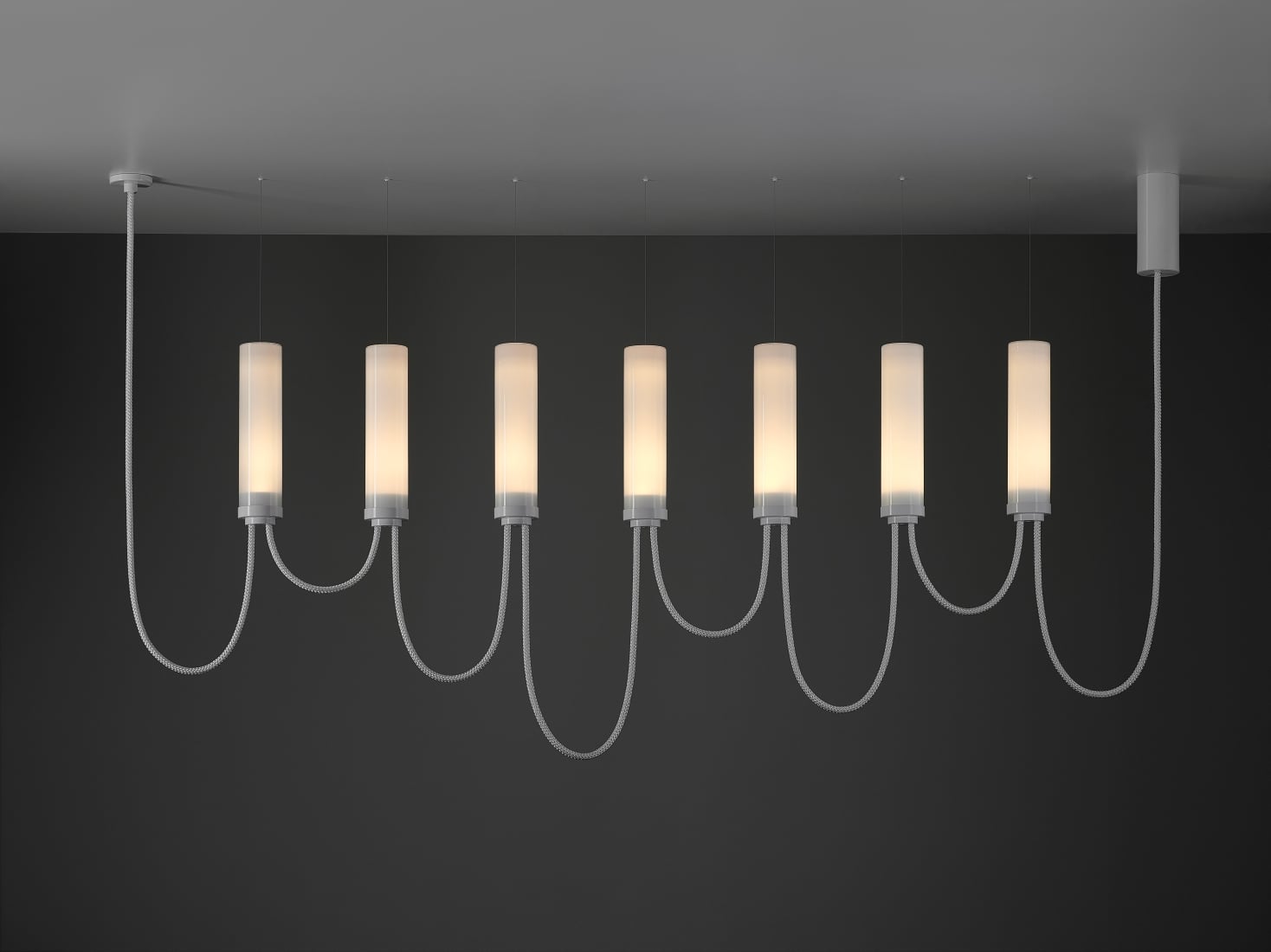 Brokis Arcade VII Horizontal Chandelier in opaline and glossy white finish with dark setting.