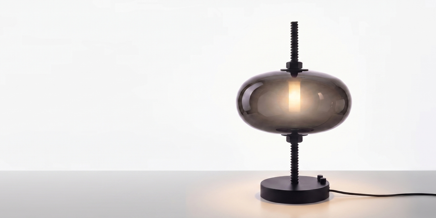 brokis-collections_under-pressure-table-most_pearl-grey-glass-and-black-finish