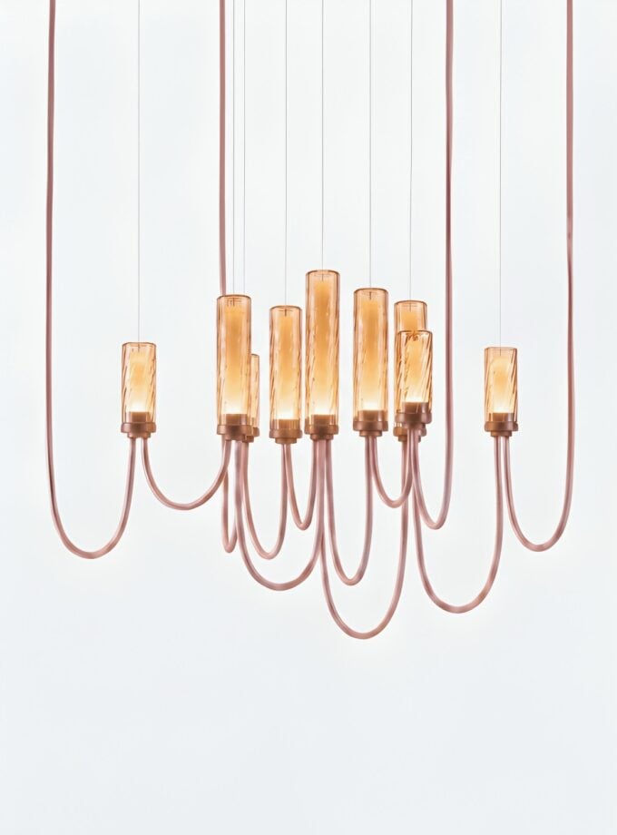 Arcade Criss-Cross Large IX Chandelier amber glass with ripples in brushed champagne finish.