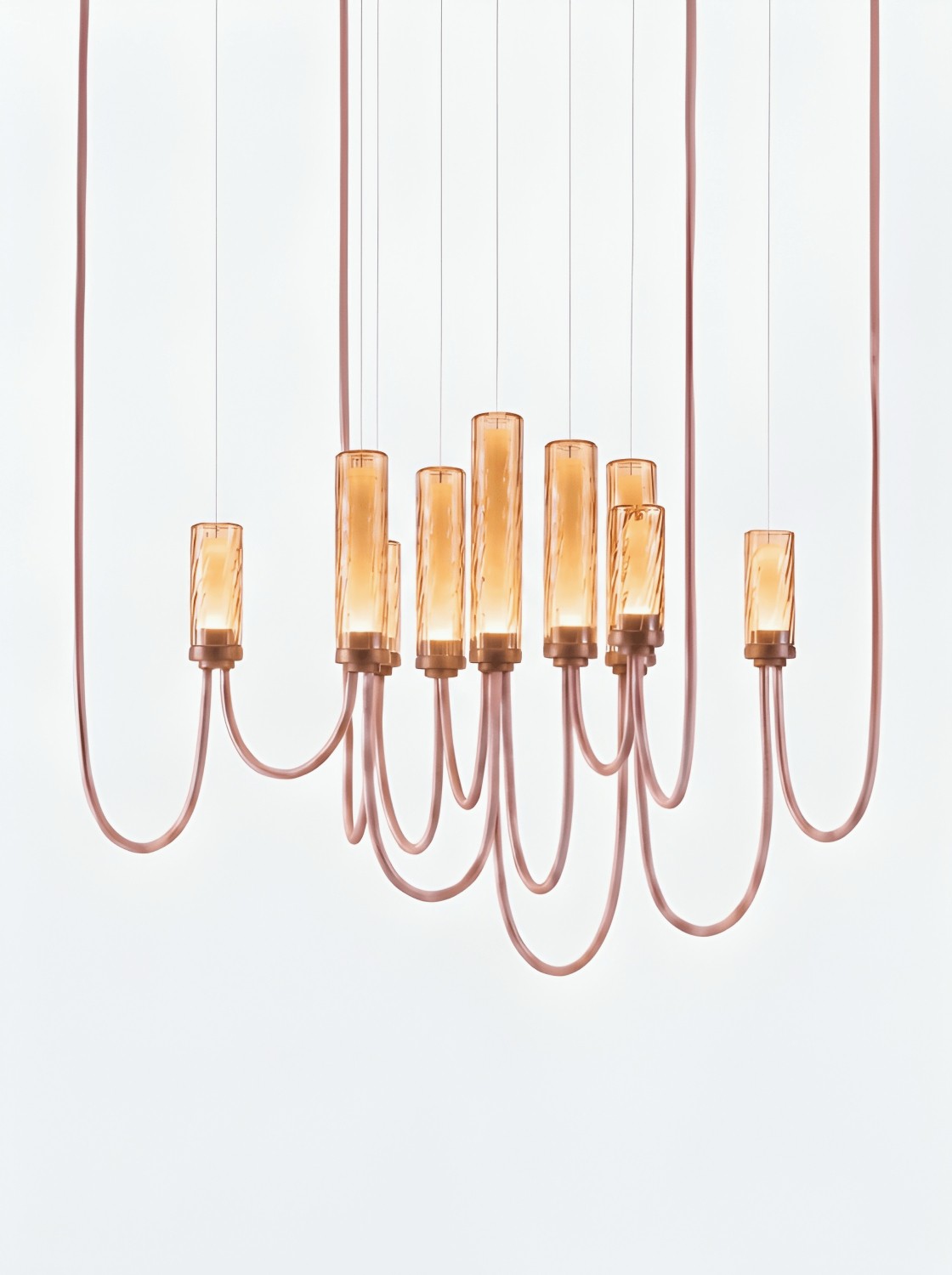 Arcade Criss-Cross Large IX Chandelier amber glass with ripples in brushed champagne finish.